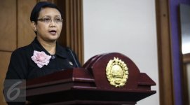 031219800_1459847367-Menlu-retno.jpg